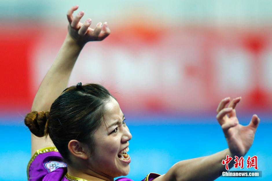 Expresiones faciales de atletas durante los Juegos Asiáticos 2014 en Incheon.
