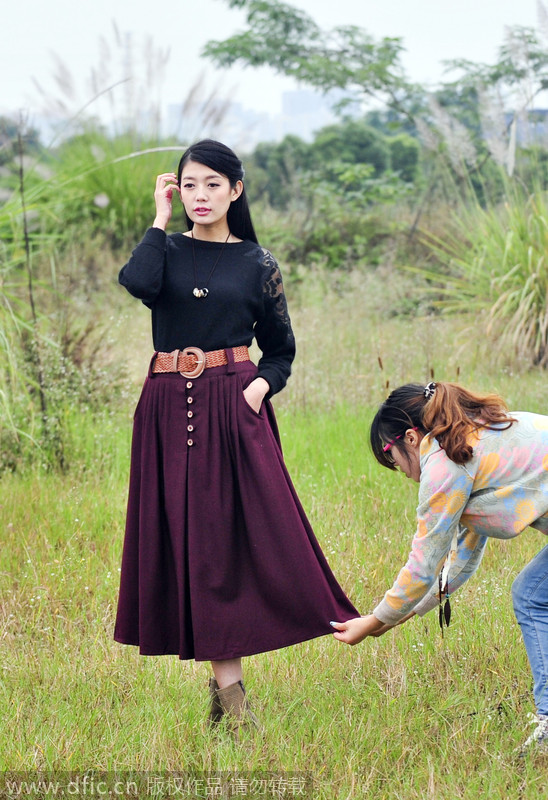 El término "chica Taobao" se ha hecho popular entre los compradores chinos, refiriéndose a las jóvenes que posan como modelo para las tiendas en línea. [Foto/IC]