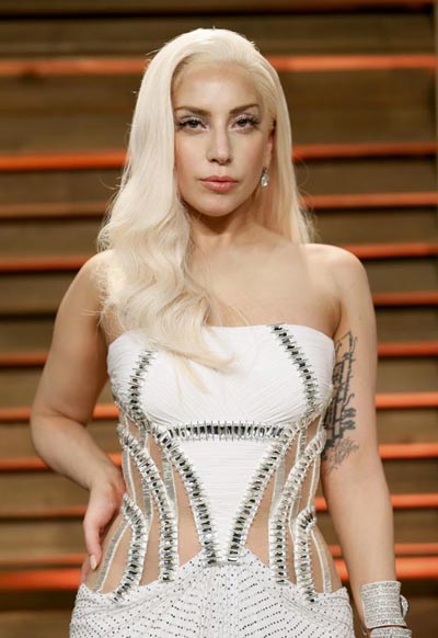 Lady Gaga llega a la fiesta Vanity Fair de los Oscars 2014 en West Hollywood, California, el 2 de marzo de 2014.