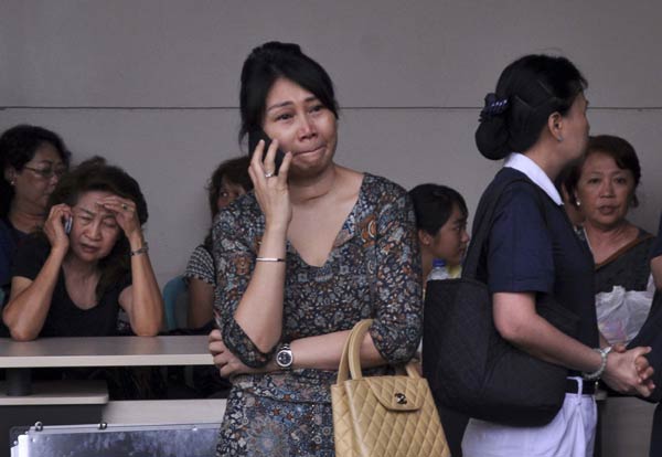 Familias devastadas por la tragedia de Air Asia