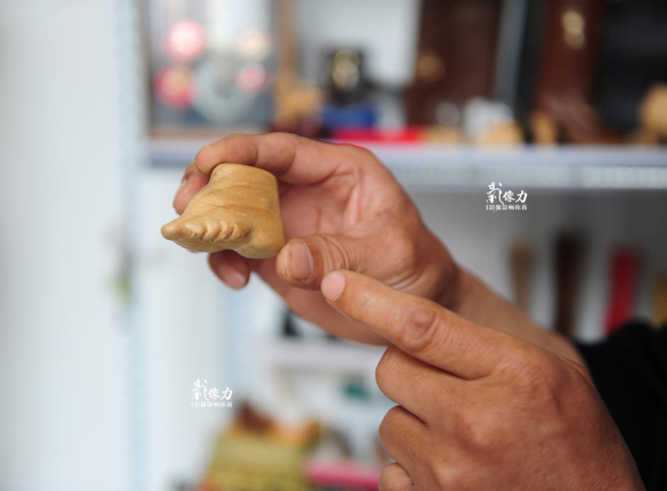 El zapatero miniaturista de Jinan