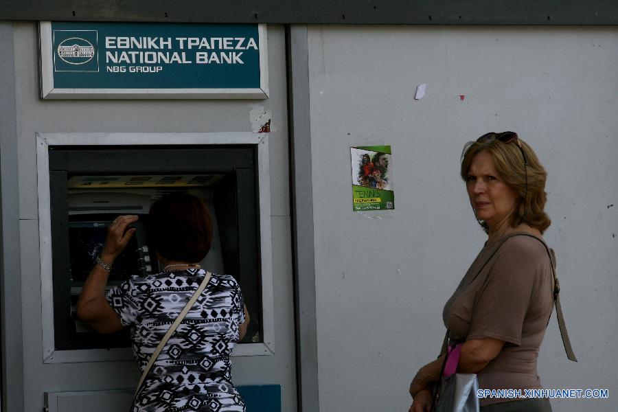 Oficial: Bancos griegos reabrirán el lunes y seguirán controles de capital