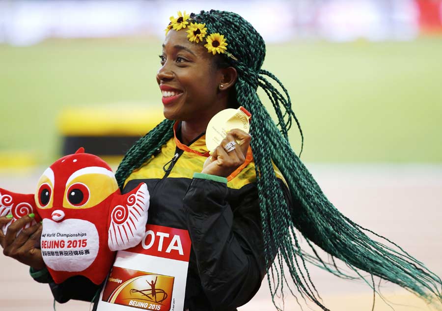 Shelly-Ann Fraser-Pryce de Jamaica, medalla de oro en la carrera femenina de 100 metros en el Mundial de Atletismo de Pekín, el 25 de agosto de 2015. [Agencias de fotografía]