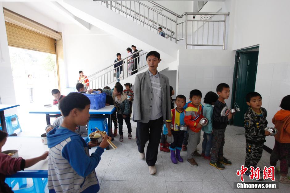 Jiang Shengfa impone orden en la escuela el 6 de septiembre. (CNS/Zhang Guangyu)