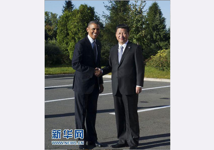 El presidente chino Xi Jinping (derecha) se reúne con el presidente de EE.UU  Barack Obama en San Petersburgo, Rusia, el6 de septiembre de 2013. Xi Jinping mantuvo conversaciones con Barack Obama al margen de la VIII Cumbre del G20. [Foto/Xinhua]