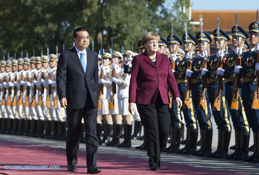 Premier chino mantiene conversaciones con canciller alemana 3
