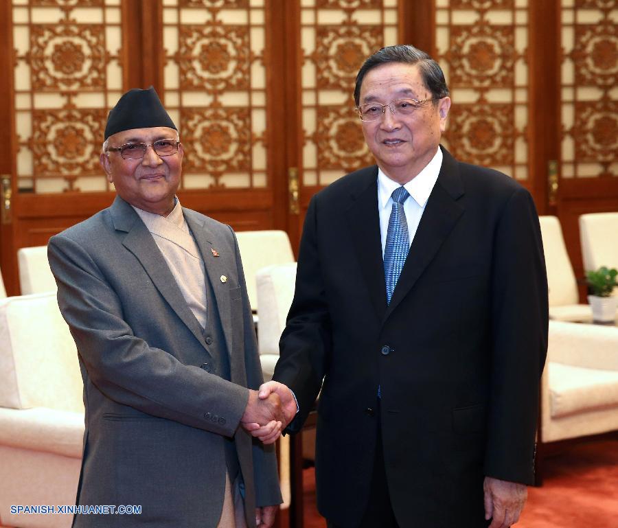 El máximo asesor político de China, Yu Zhengsheng, se reúne con el primer ministro nepalés, K. P. Sharma Oli, en Beijing, capital de China, el 23 de marzo de 2016. (Xinhua/Pang Xinglei)