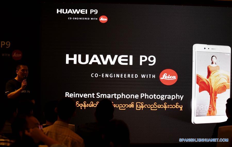 YANGON, junio 18, 2016 (Xinhua) -- La ceremonia de lanzamiento del nuevo teléfono inteligente P9 de Huawei, se lleva a cabo en Yangon, Myanmar, el 18 de junio de 2016. El gigante de las telecomunicaciones chino Huawei lanzó este sábado su nuevo teléfono inteligente P9 de doble lente en Yangon. (Xinhua/U Aung) 