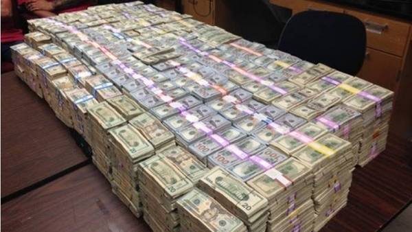 Hallan 24 millones de dólares en cubos en la casa de un traficante en Miami
