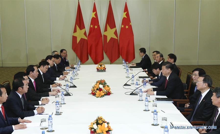 El presidente de China, Xi Jinping, se reúne con el presidente de Vietnam, Tran Dai Quang, en Lima, Perú, el 19 de noviembre de 2016. (Xinhua/Pang Xinglei)