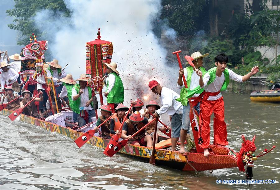 Actividad de botes de dragón, en Guangzhou