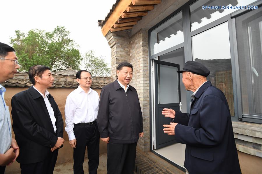 El presidente de China, Xi Jinping, dijo que debe hacerse más para acabar con la pobreza y mejorar los estándares de vida en áreas de bases revolucionarias.(Xinhua/Li Xueren)