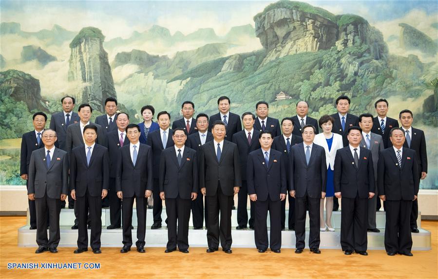 Xi se reúne con grupo visitante de amistad del PTC de la RPDC