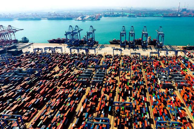 Como miembro de la Organización Mundial del Comercio, China contribuye al desarrollo global