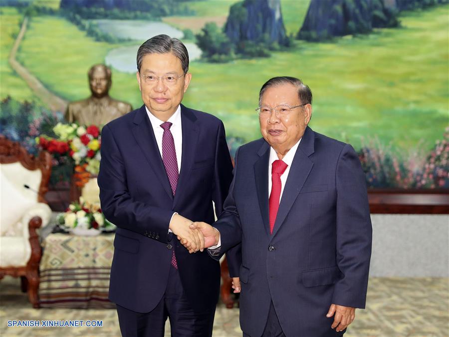 China y Laos acuerdan profundizar lazos bilaterales entre partidos y países