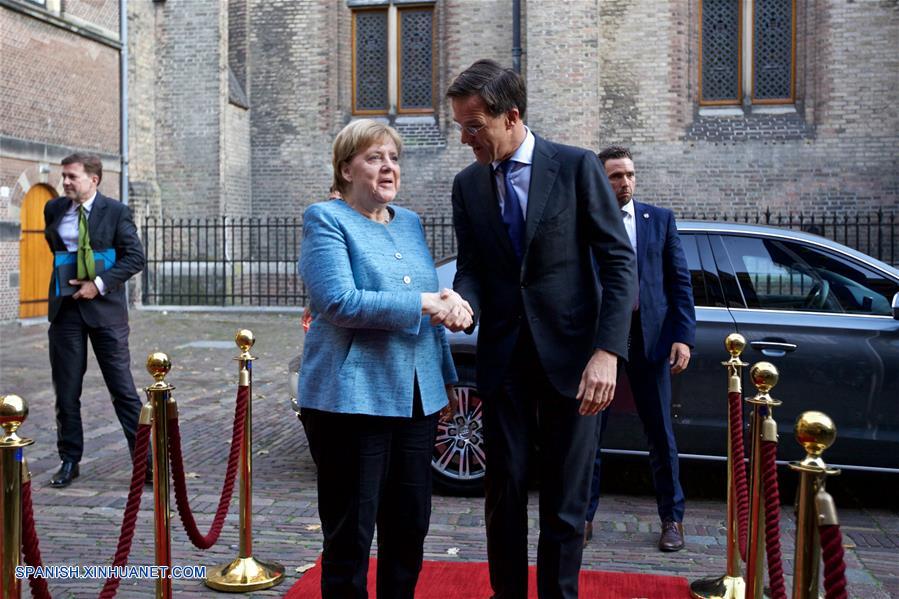 Rutte y Merkel esperan más avances en conversaciones sobre Brexit