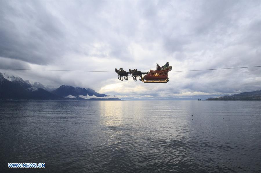 Un Papa Noel “volador” anima el mercado navideño suizo