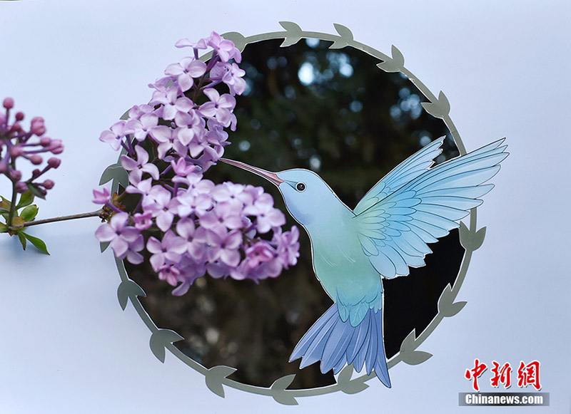 El arte chino del papel recortado ensalza la hermosa primavera