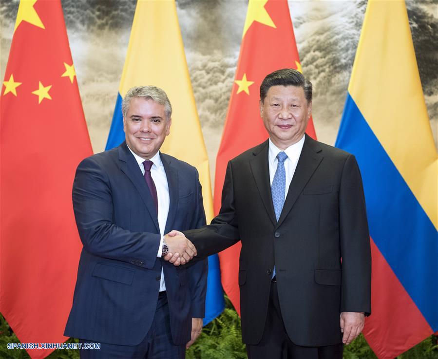 El presidente chino, Xi Jinping (d), sostiene conversaciones con el presidente de Colombia, Iván Duque Márquez, en el Gran Palacio del Pueblo en Beijing, capital de China, el 31 de julio de 2019. (Xinhua/Li Xueren)