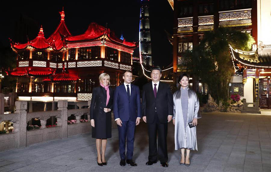 Xi y su esposa se reúnen con presidente francés y su esposa