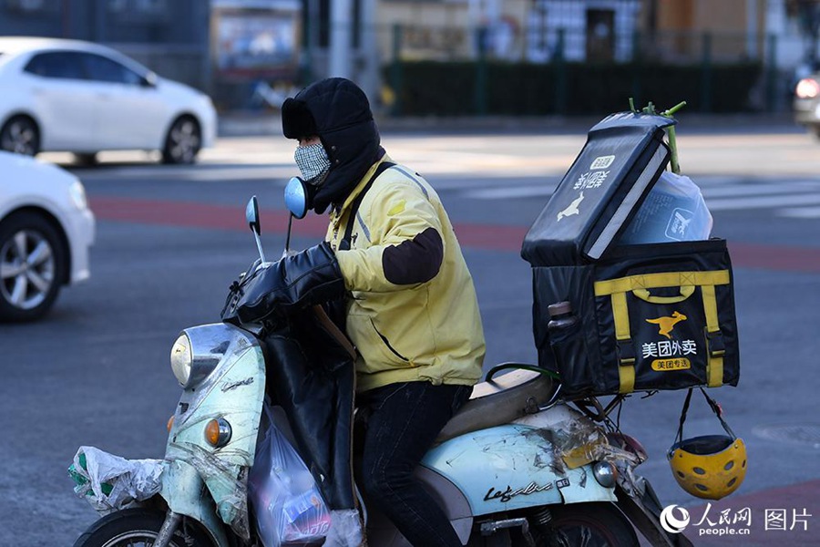 La vida cotidiana en Beijing durante la batalla contra el COVID-19