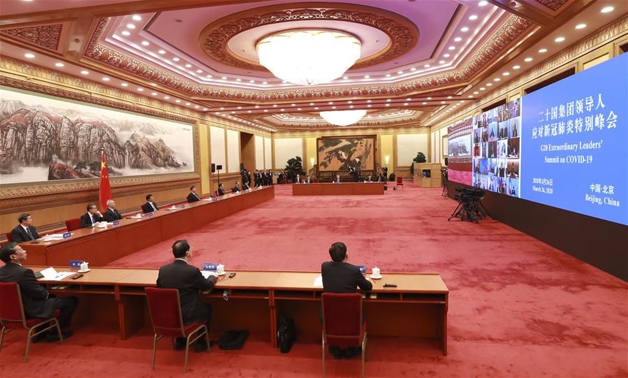 El presidente chino, Xi Jinping, asiste a la Cumbre Virtual Extraordinaria de Líderes del G20 sobre COVID-19, a través de un videoenlace en Beijing, capital de China, el 26 de marzo de 2020. (Xinhua/Pang Xinglei)