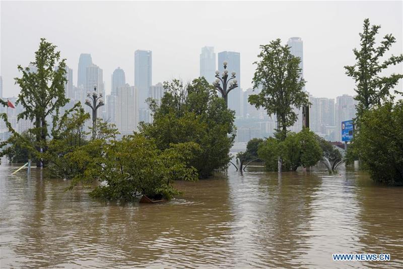 Fotografía tomada el 20 de agosto de 2020. Sección inundada de la carretera Nanbin del distrito de Nan'an del municipio de Chongqing (suroeste de China). [Foto: Xinhua]