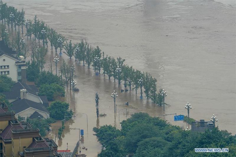 Fotografía tomada el 20 de agosto de 2020. Sección inundada de la carretera Nanbin del distrito de Nan'an del municipio de Chongqing (suroeste de China). [Foto: Xinhua]