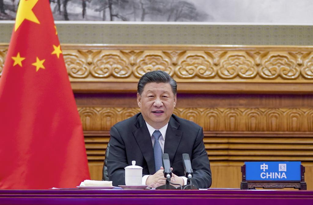 El presidente chino, Xi Jinping, participa en una Video Cumbre sobre el Clima con el presidente francés, Emmanuel Macron, y la canciller alemana, Angela Merkel, en Beijing, capital de China, el 16 de abril de 2021. (Xinhua/Li Xueren)