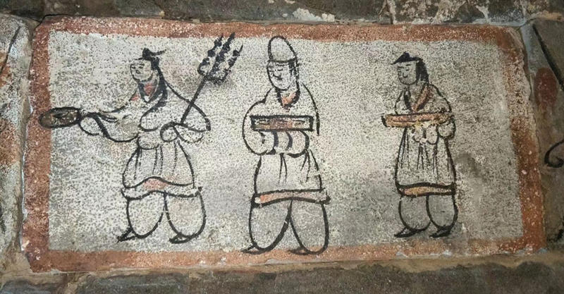 Un mural pintado sobre un ladrillo del grupo de una tumba. [Foto / chinadaily.com.cn]