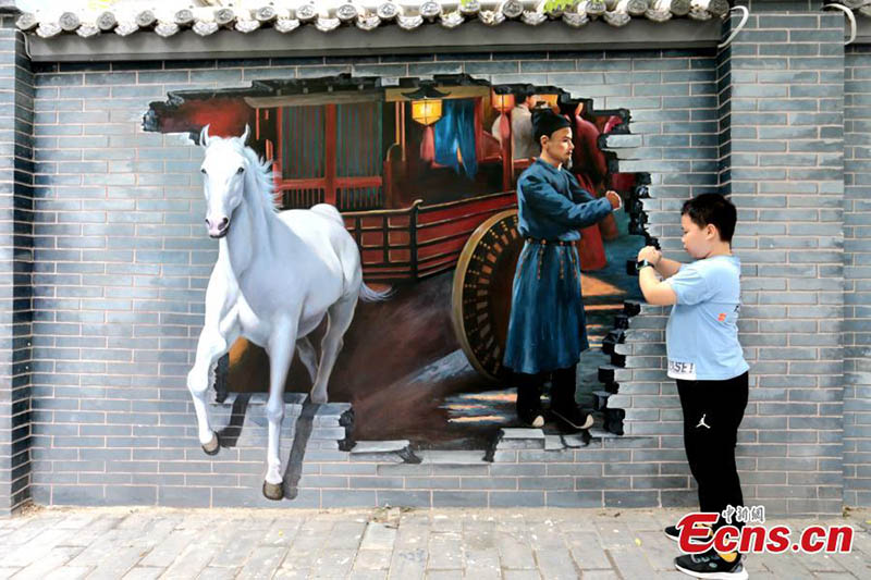 Murales con elementos chinos antiguos atraen a los visitantes a Xi'an