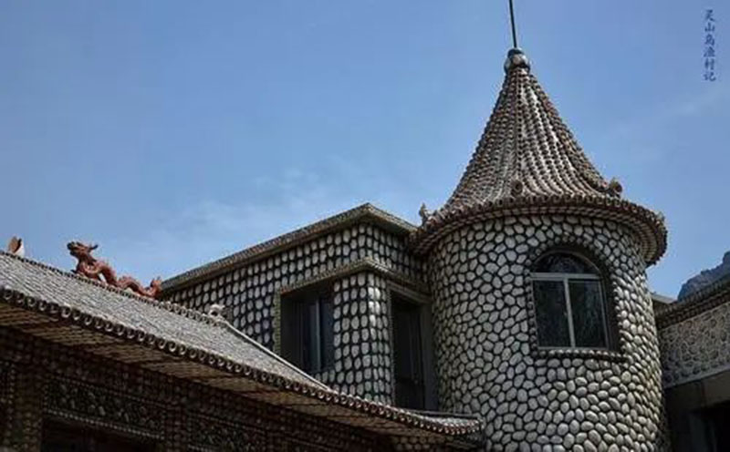 Una vista exterior de la casa con temática de conchas. (Foto / thepaper.cn)