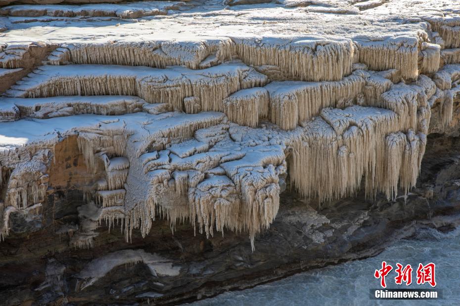Hermosas imágenes de la cascada Hukou en el río Amarillo cubiertas de hielo