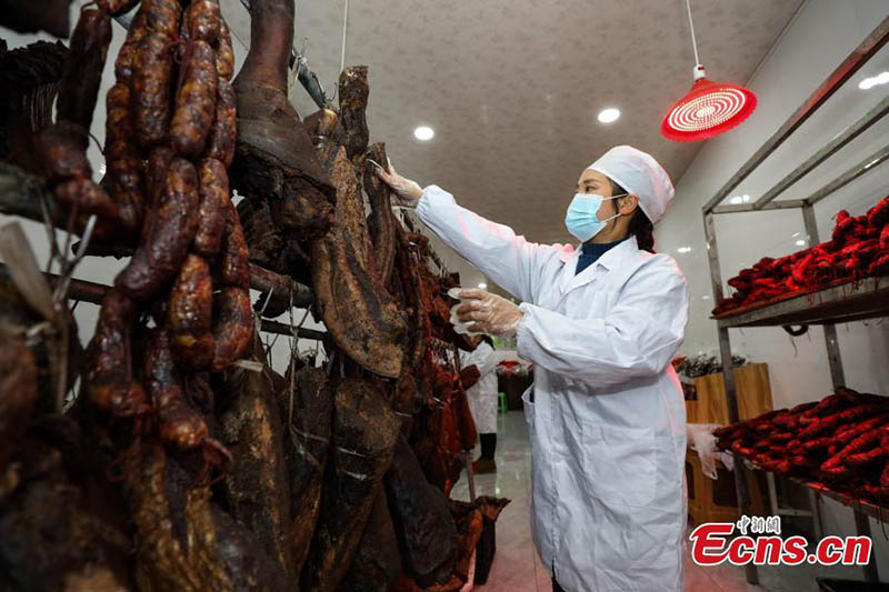 El aroma a carne curada rebosa en Guizhou