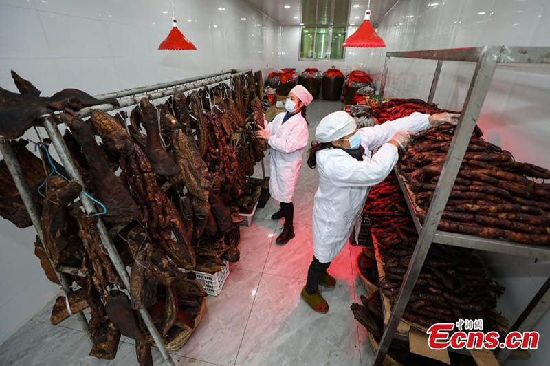 El aroma a carne curada rebosa en Guizhou