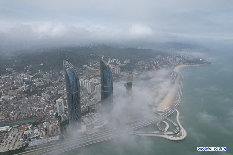 Fujian: Paisaje de niebla de advección en Xiamen