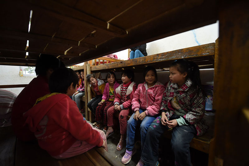 El 19 de noviembre de 2014, los niños de la escuela primaria Yudong en el dormitorio.