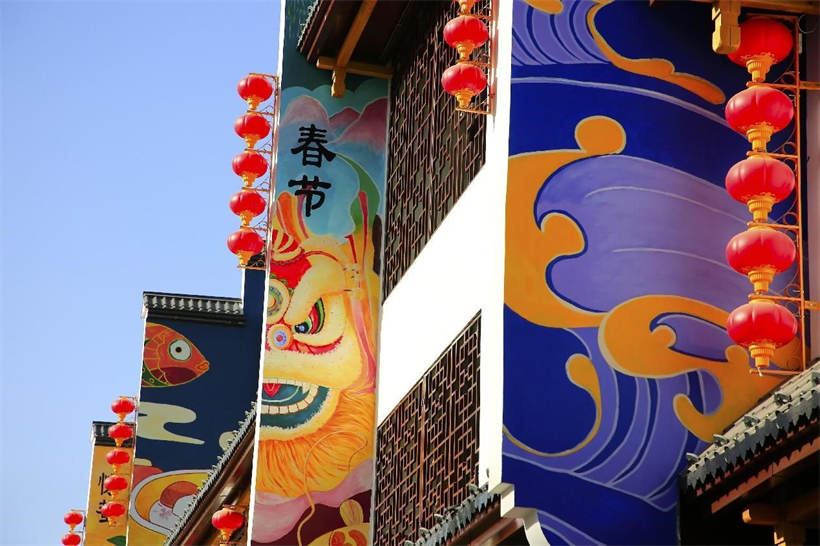 Pinturas en la pared temática de "veinticuatro términos solares" se presentan en el bloque característico de la calle Xinchang, Distrito Jinfeng, ciudad de Yinchuan, región autónoma de la etnía Hui de Ningxia. (Foto: Yuan Hongyan / Pueblo en Línea)