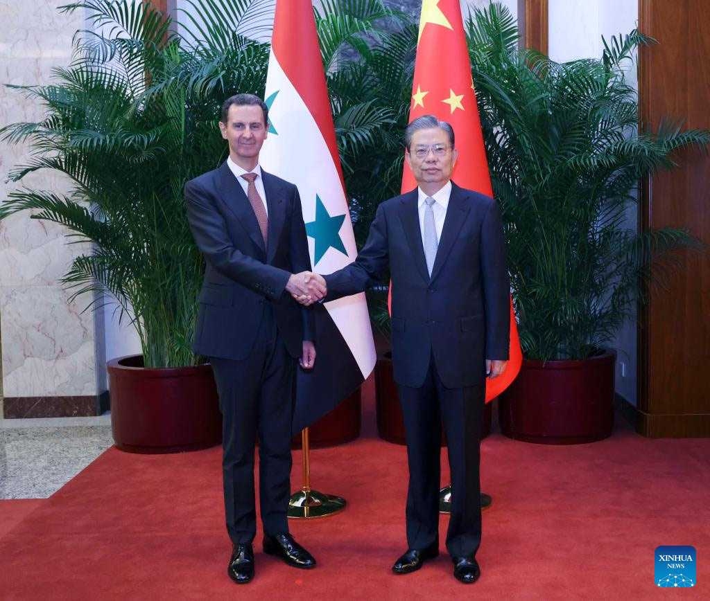 Máximo legislador chino se reúne con presidente de Siria