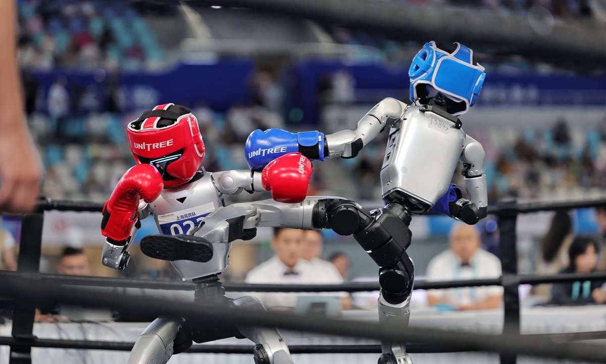 Habilidades de los humanoides del mundo real se ponen a prueba en la lucha libre de los II Juegos Mundiales de Robots Humanoides