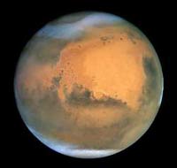 Marte y la luna brillan para vísperas de Navidad