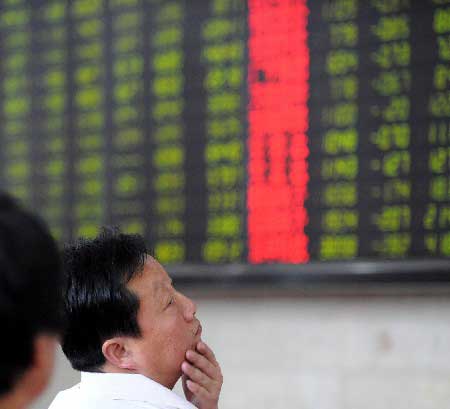 Bolsas chinas abren con pérdida de 0,98%