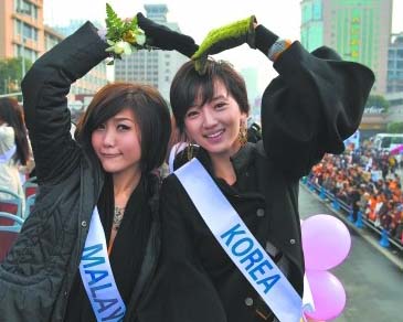 Concursantes de Miss Internacional provocan admiración en Chengdu