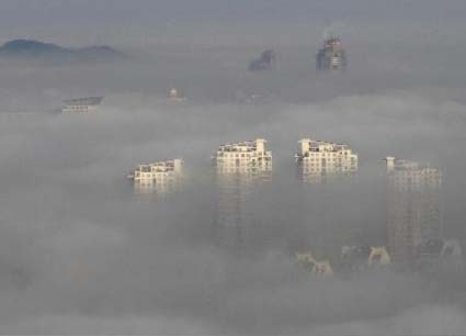 Grupo de fotos: Espejismo en tiniebla aparece en Weunling de Zhejiang