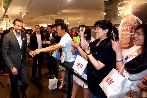 Los Beckham brillan en China